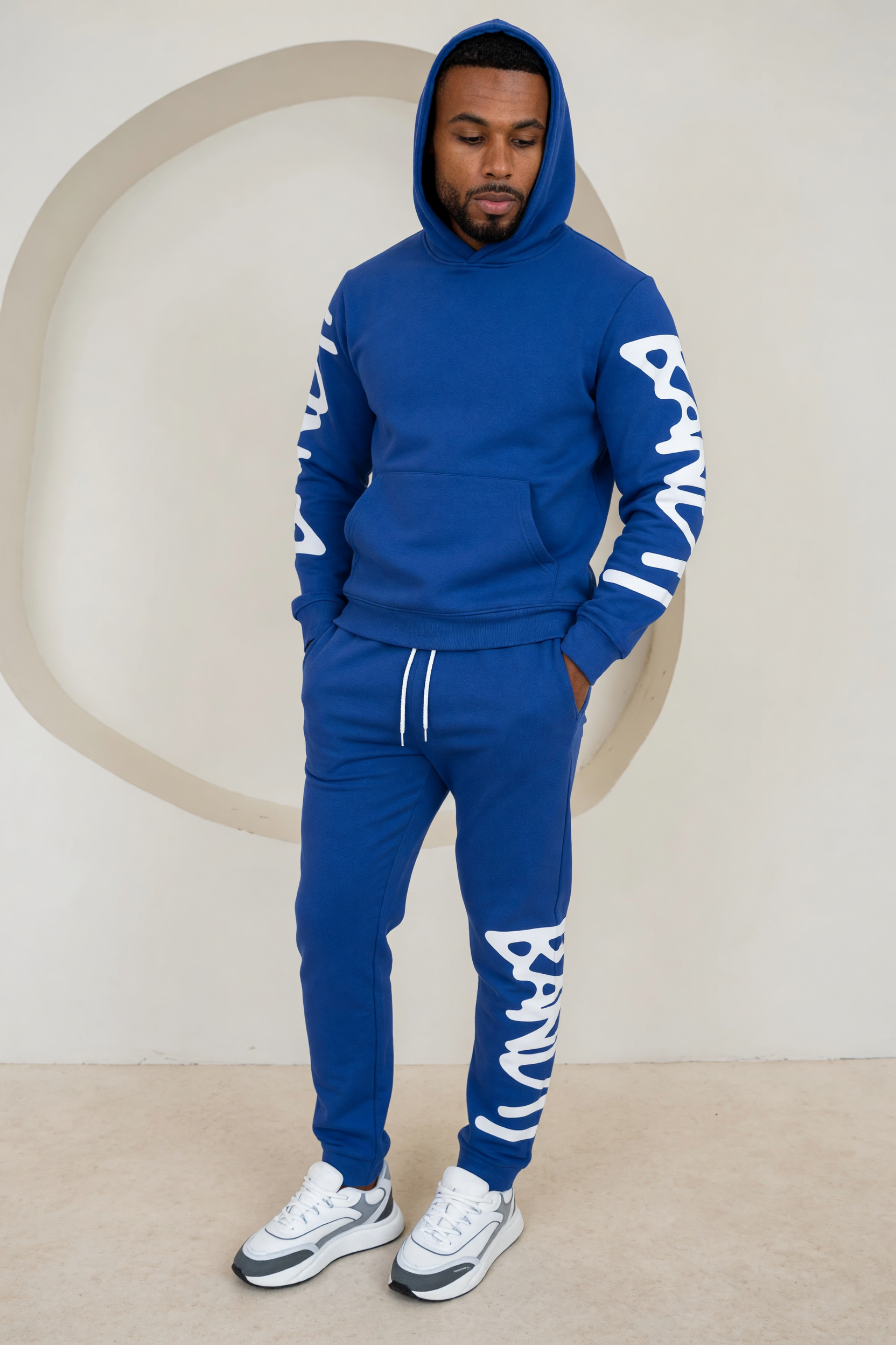 Generated on-model try-on — royal blue Bandit tracksuit